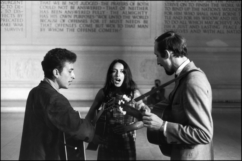 thumbnail of Bob Dylan, Joan Baez, Paul Stookey, Lincoln Memorial by Dan Budnik. medium: silver gelatin print. date: August, 1963. dimensions: 11 x 16.375 inches