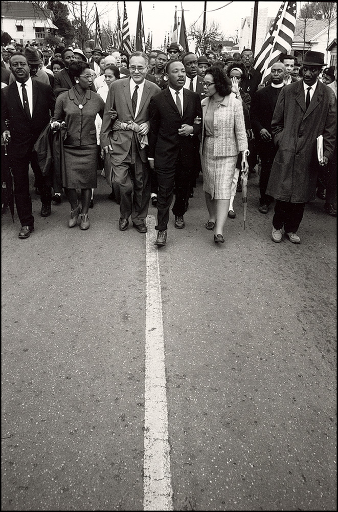 thumbnail of Entering Montgomery on Oak street. L to R Ralph and Juanita Aberathy, Ralph Bunche, Martin Luther King Jr. and Coretta by Dan Budnik. medium: silver gelatin print. date: March, 1965. dimensions: 16.5 x 11 inches