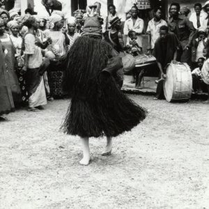 thumbnail of Masked Sande Dancer from Bumpe Chiefdom, Sierra Leone. medium: unknown. date: 1976. height: unknown