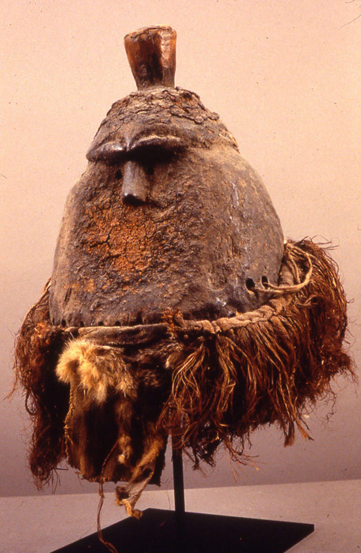 thumbnail of Poro Helmet Mask from Toma, Liberia/Guinea. medium: Wood, leather, raffia. date: unknown. height: 11 inches