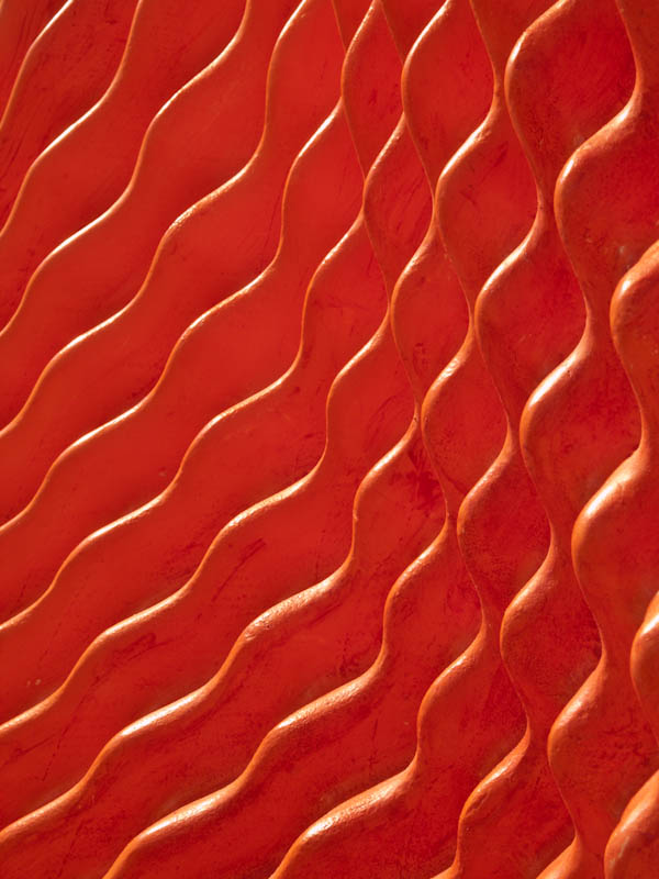 Re-Echo by American artist David Henderson. medium: aqua resin, orange pigment. date: 2010. Sculpture