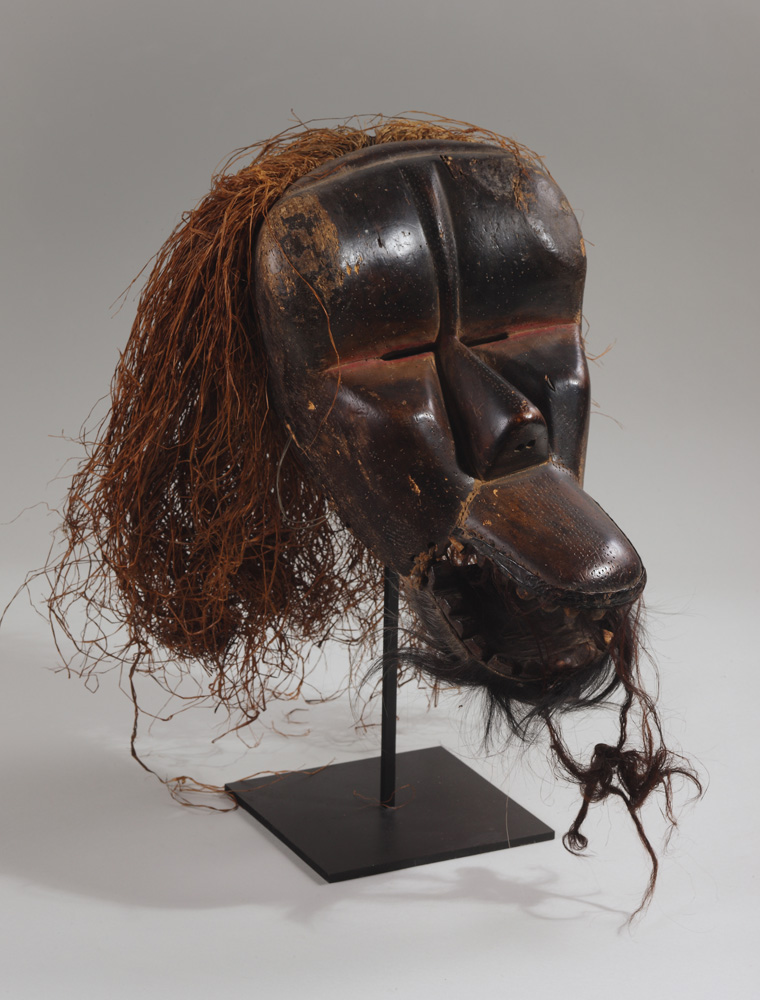 thumbnail of Monkey Mask from Dan, Ivory Coast/Liberia. medium: wood, raffia, fur, pigment. dimensions: unknown. date: unknown.