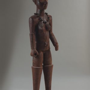 thumbnail of Display Figure from Igbo, Nigeria. medium: wood, brass bells, kaolin. dimensions: unknown. date: unknown.