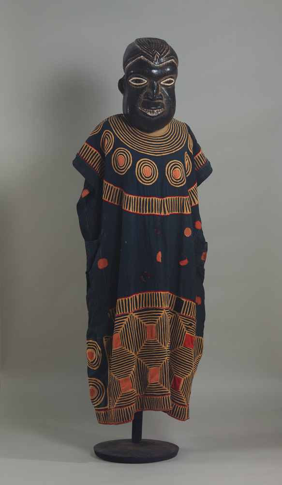 thumbnail of Female Leader Ensemble (Ngon, Ngoin) from Baumum, Cameroon. medium: Wood, fabric, thread, kaolin. dimensions: unknown. date: unknown