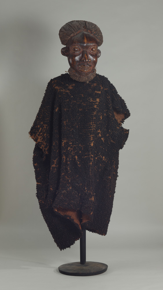 thumbnail of Male Leader Ensemble (Kam) from Bamum, Cameroon. medium: Wood, woven raffia, human hair, rope, camwood pigment. dimensions: unknown. date: unknown.