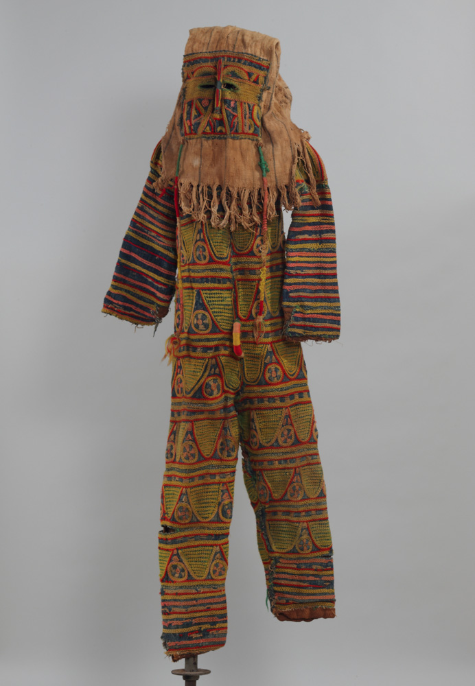 thumbnail of Costume with Cloth Mask from Igbo, Nigeria. medium: layered textiles, yarn, burlap. date: unknown. dimensions: unknown.