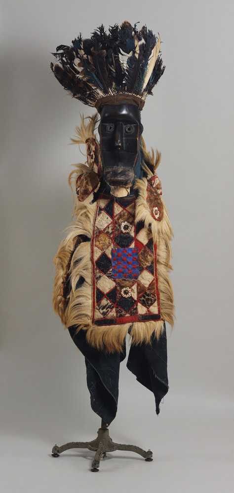 thumbnail of Mask Ensemble from Kpelle (Guerze) Liberia/Guinea. medium: Wood, fur, fabric, feathers, cowries. date: unknown. dimensions: unknown