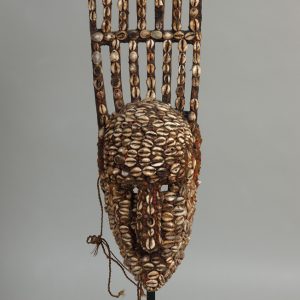 thumbnail of N'Tomo Mask from Bamana, Mali. medium: wood, cowrie shells, abrus precatorius seeds, wax or resin. date: unknown. dimension: unknown.